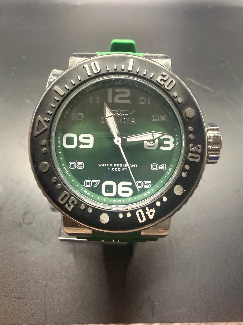 Invicta Pro Diver watch features a bold green dial And Band New Battery